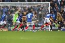 Conor Shaughnessy (No18) finds the net for Portsmouth in the final seconds