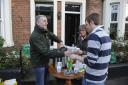 FLOOD: Daph and Dave Rudd of the Hebron Church hand out warm drinks and food to flood victims in Hart Street, Carlisle, December 6, 2015