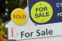 Stock image of house sale signs