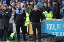 Paul Simpson with coach Billy Barr on the touchline at Bristol Rovers