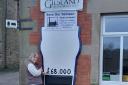 Cathy Mousette, a member of the GCBSL, made the beer-o-meter to display the funds raised to purchase The Samson Inn