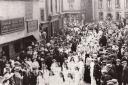Morris dancers leading the procession for the George V coronation celebrations, 1911, Market Place, Wigton.