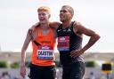 Oliver Dustin, left, with Elliot Giles after yesterday's race in Manchester (photo: PA)