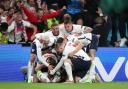England celebrate after Kane made it 2-1 (photos: PA)