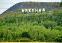 Is Ryan Reynolds responsible for the Wrexham Hollywood sign? (PA)