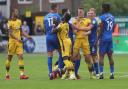United and Sutton players clash (photo: Richard Parkes)