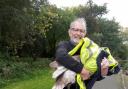 Steve Bulman pictured with the Swan that was rescued at Hammonds Pond Park