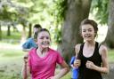 FUN: Tilda Hollins and Ciara Edmondson take part in a 2016 Junior Parkrun in Carlisle