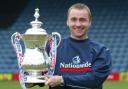 Paul Simpson with the FA Cup during Rochdale's run to the fifth round in 2002/3 (photos: PA)