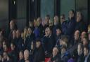 Ryan Giggs and Nicky Butt are pictured in the directors' box, a few seats along from Carlisle's directors
