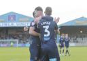 Ryan Edmondson is congratulated for putting United ahead