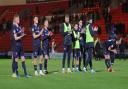 Carlisle's players applaud the 1,222 travelling fans at Doncaster