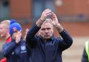 Paul Simpson applauds United's 1,177 fans after the Leyton Orient defeat