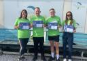 Egremont Coop workers raised more than £1000 for Samaritans with their skydive