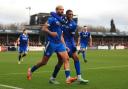 Jayden Harris, right, celebrates with Eastleigh matchwinner Paul McCallum in the Reading game