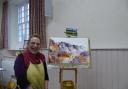 The art society witnessed a live demonstration on painting landscapes