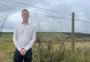 Conservative candidate Andrew Johnson at the site of the proposed coal mine in Whitehaven
