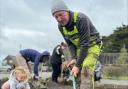 Volunteers re-develop the flower beds