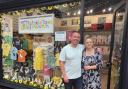 Twinkletoes of Penrith Owners Andrew and Liane Dixon next to their award-winning shop window display