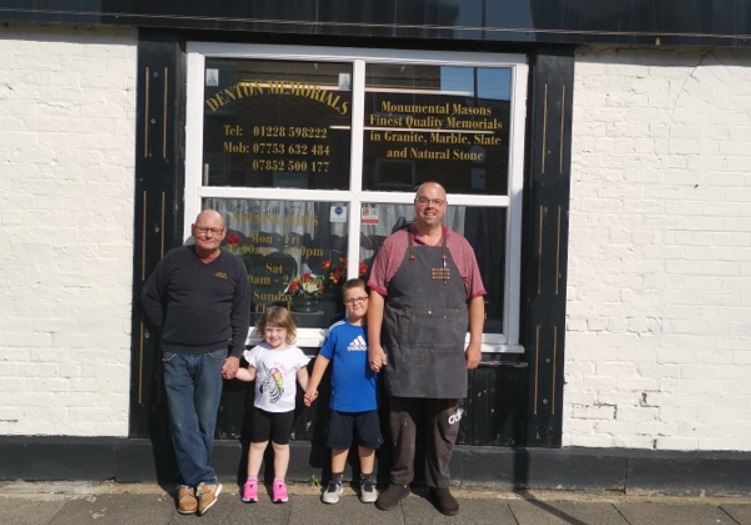 Family business: (Ledt to right) Denton Memorials Managing Director, Tony Box; grandchildren, Lydia and Thomas; and Operations Director, Paul Allen 