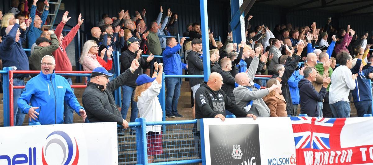 Workington Town supporters applaud the win (Ben Challis)