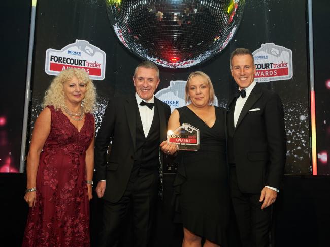 PROUD: Members of the G&E Murgatroyd team at the Forecourt Awards with Strictly's Anton du Beke