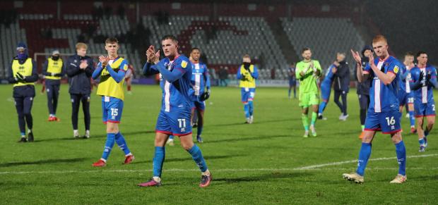 News and Star: United players applaud the travelling fans at Stevenage (photo: Richard Parkes)