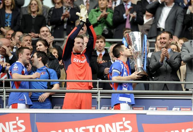 News and Star: Collin and his United team-mates after winning the Johnstone's Paint Trophy at Wembley in 2011 (photo: Jonathan Becker)