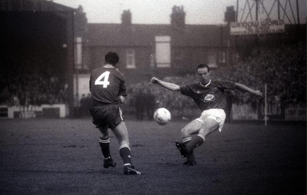 News and Star: John Halpin sends in a cross for United against Liverpool