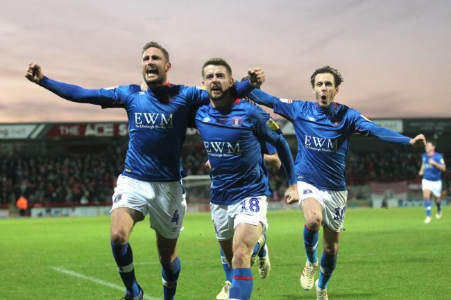 Gary Liddle, Jack Sowerby and Jamie Devitt celebrate during United's last New Year's Day win in 2019 (photo: Barbara Abbott)