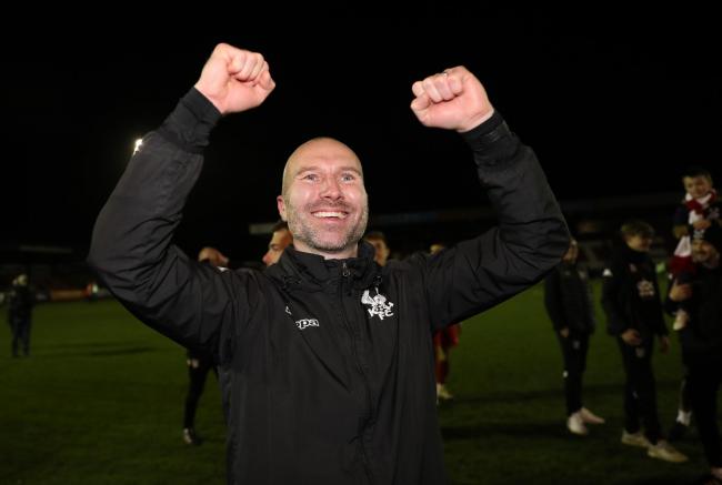 Russell Penn celebrates Kidderminster's famous victory (photo: PA)