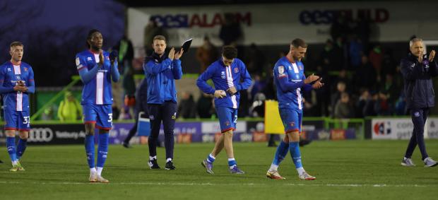 News and Star: United applaud the travelling fans after the game