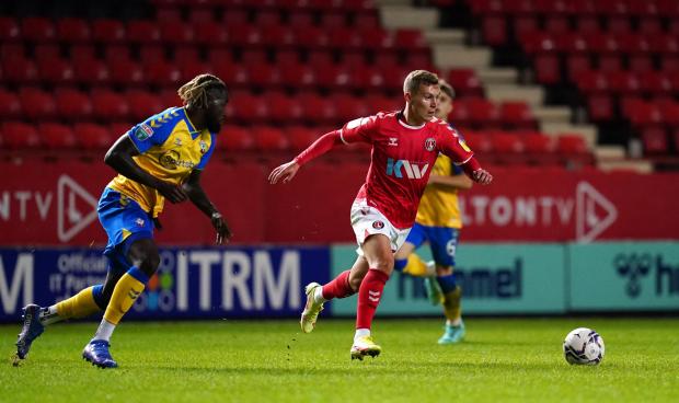 News and Star: Simeu, left, in action for Southampton U21s against Charlton in the Papa John's Trophy (photo: PA)