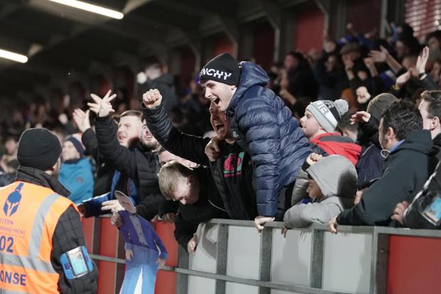 News and Star: United fans celebrate the equaliser at Salford - but the joy was short-lived