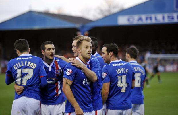 News and Star: Grainger says that, at Carlisle, team-mates and their families would often socialise - but those interactions don't happen as much with players today (photo: Stuart Walker)