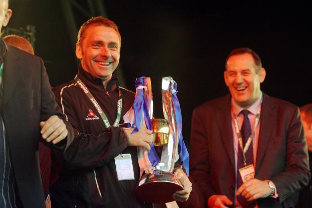 News and Star: The League Two title under Paul Simpson and owner Fred Story, right, remains Carlisle United's last promotion