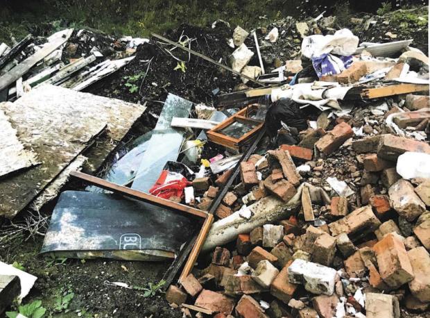 News and Star: Unsightly: Just some of the rubbish found at the Clarghyll site.