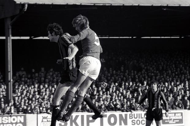 News and Star: United's Bill Green wins an aerial tussle against Fulham