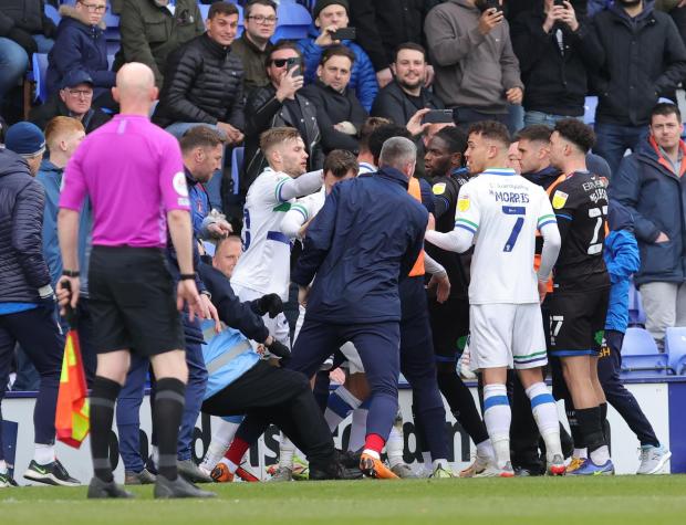 News and Star: A steward takes a tumble amid the confrontation between players and subs