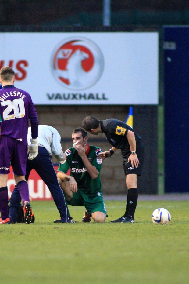 News and Star: Livesey's brave defending meant he was regularly in need of the physio's attention