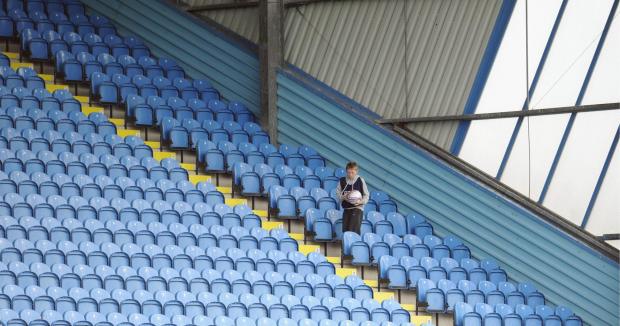 News and Star: A ball boy retrieves the ball from the East Stand