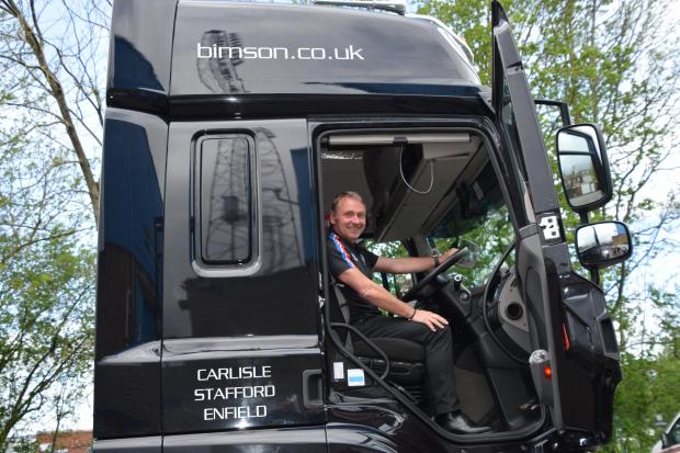 News and Star: United manager Paul Simpson in one of the Bimson lorries