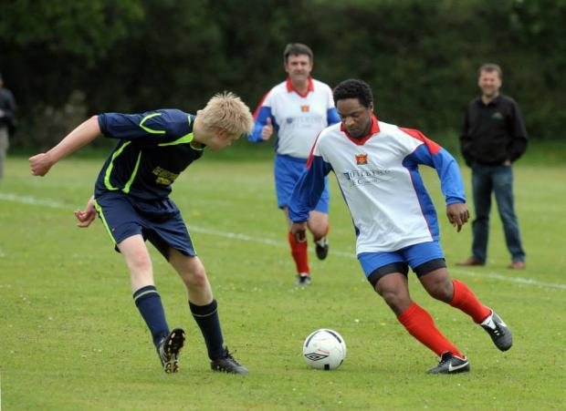 News and Star: Ex-United star Andy Watson in action for the 'OAP' team