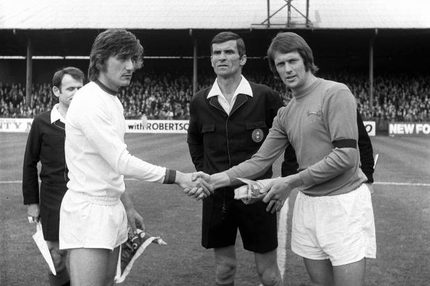 United captain Chris Balderstone shakes hands with his Roma counterpart in the Brunton Park game