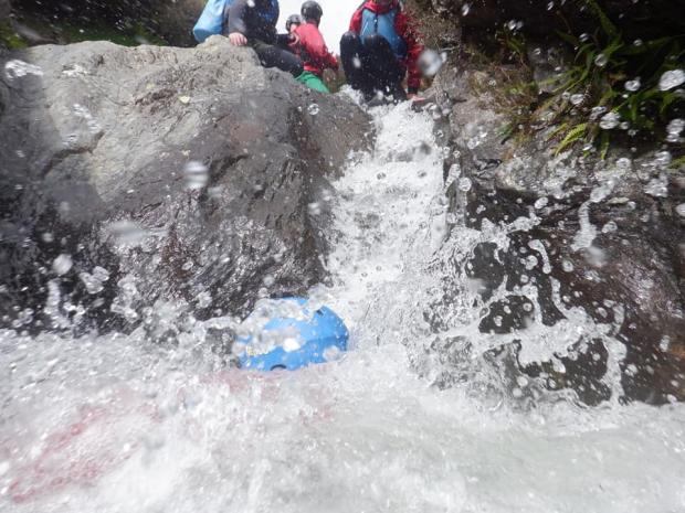 News and Star: Soaking wet as the adventurer slides down the waterfall. 