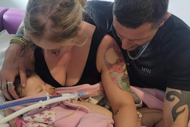 FAMILY: Jonathan Mould and Laura Dearden with baby Savannah