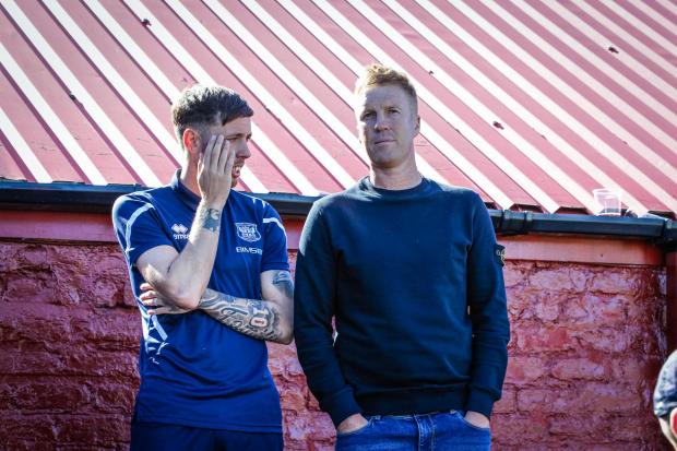 News and Star: Jamie Devitt, left, chats to ex-United midfielder Chris Lumsdon