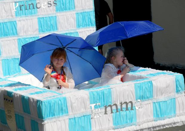 News and Star: Enjoying the fun of the float Photo: Mike Grierson