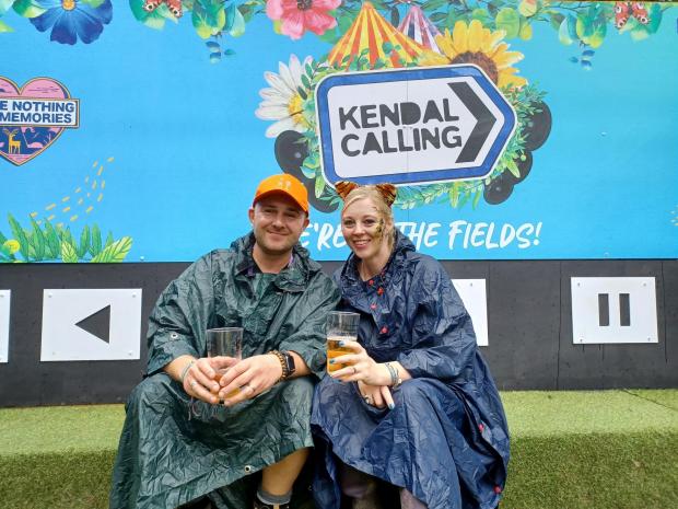 News and Star: Simon Broadbent and Helen Leyland came prepared for the weather 