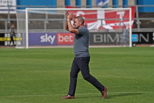 News and Star: Paul Simpson applauds fans after the victory